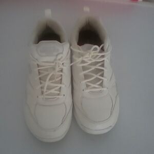 White Sketchers work shoes
